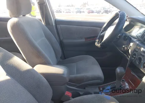 2004 Toyota Corolla Le z USA, uszkodzony, nr VIN 2T1BR32E84C181854